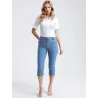 Women denim capri trousers blue with red zip pockets front view