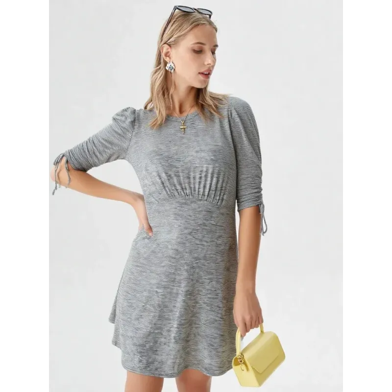 Short grey knit dress with A-line cut and ruched detail for women