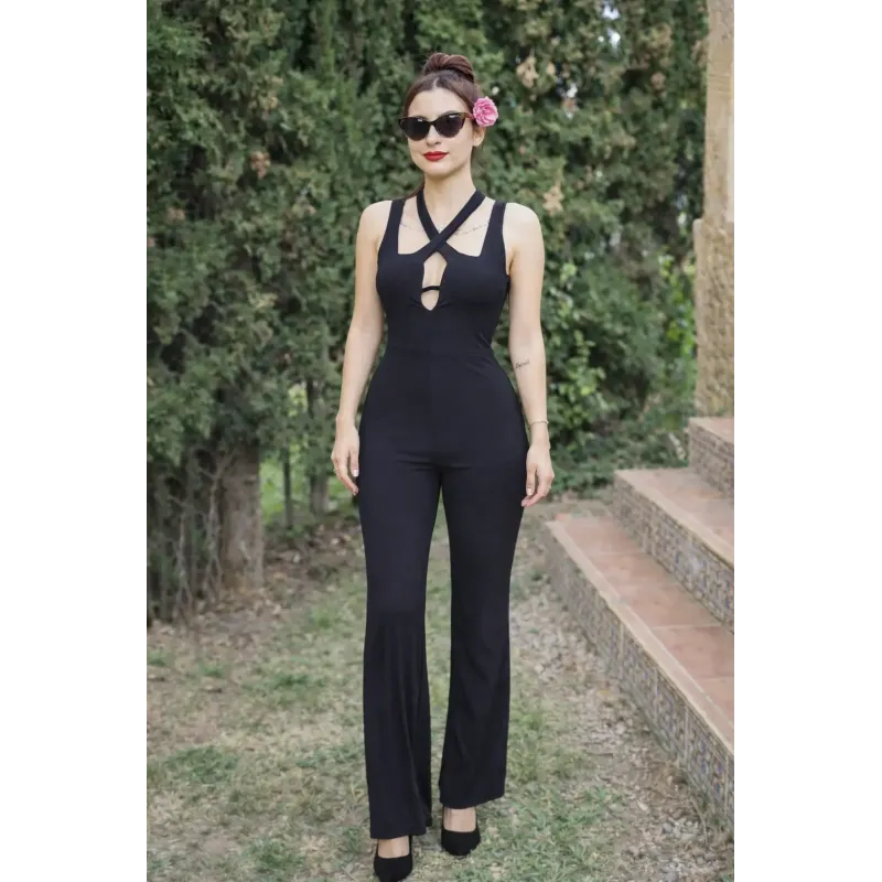 Long black party jumpsuit women with halter straps and deep neckline, elegant and fluid for events and parties