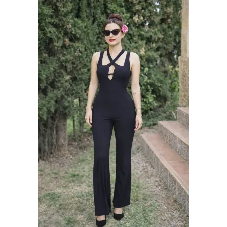 Long black party jumpsuit women with halter straps and deep neckline, elegant and fluid for events and parties
