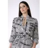 Vestido midi estampado periódico vista frontal | Vestidos midi | Buscarmoda