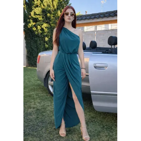 Emerald green draped dress with asymmetric design and elegant front slit for evening events
