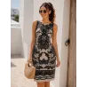 Beige baroque fitted dress with black ornamental pattern and boat neckline