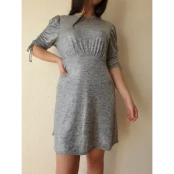 Short grey knit dress front view with A-line silhouette and ruched bust