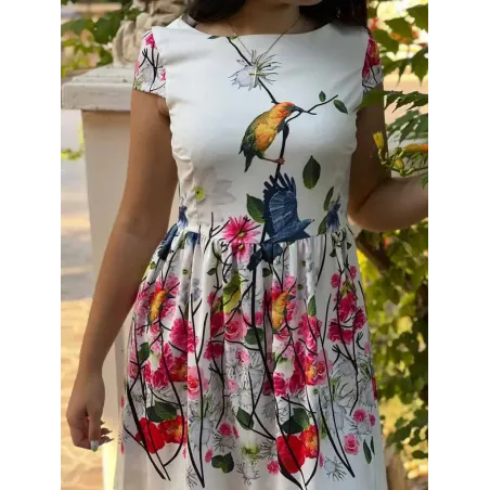 White short printed dress with boat neckline, fitted bodice and gathered skirt for women