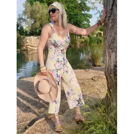 Beige floral strappy jumpsuit, elegant and comfortable for a fresh look.